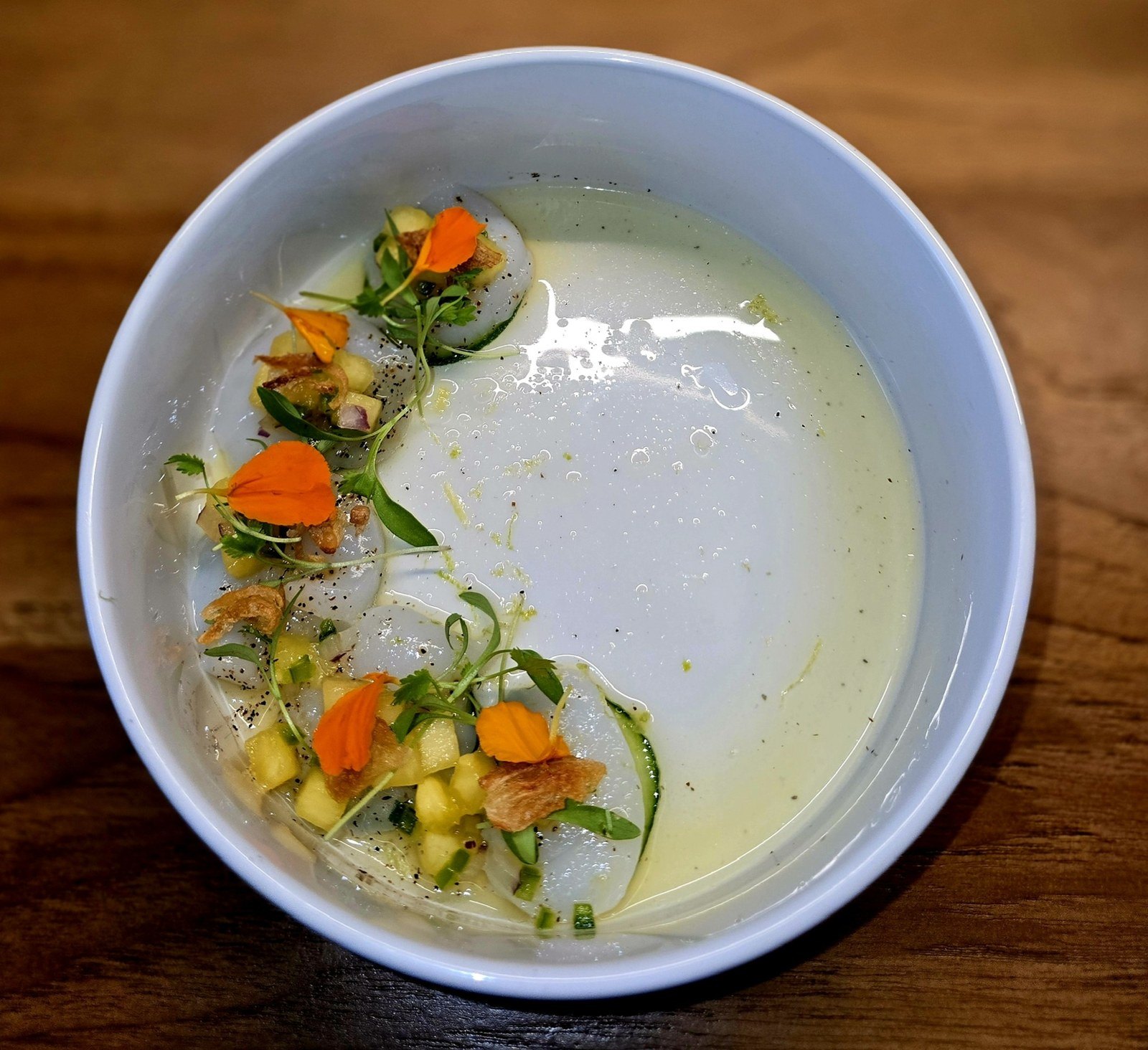 Crudo in citrus broth