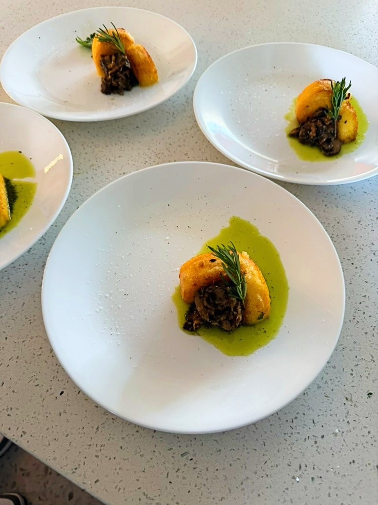 Tasting course plated on white porcelain