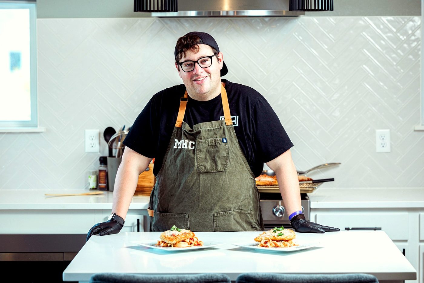 Chef Steve plating a course at a private chef dinner service