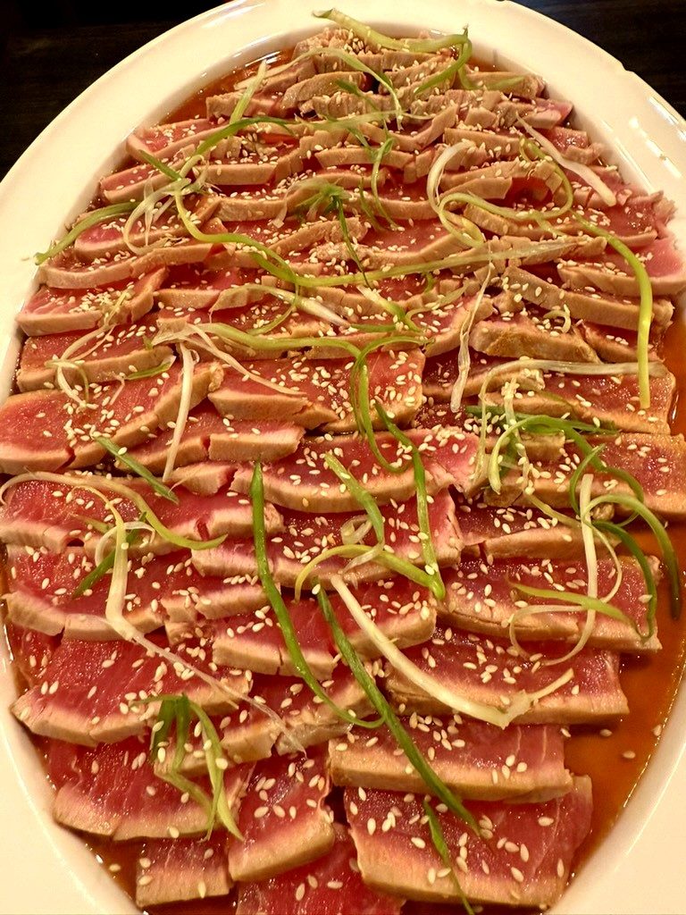 Seared ahi tuna tataki canape served at a luxury mountain wedding